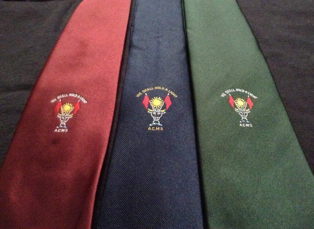 ACMS ties in red, blue and green